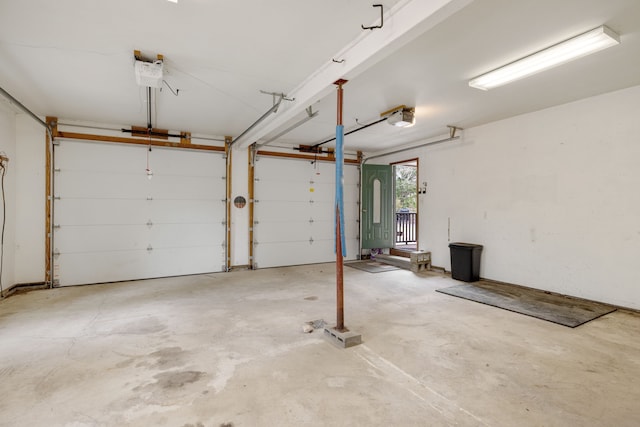 4824 Little Cedar Creek Dr, Attica, MI 48412 - garage featuring a garage door opener