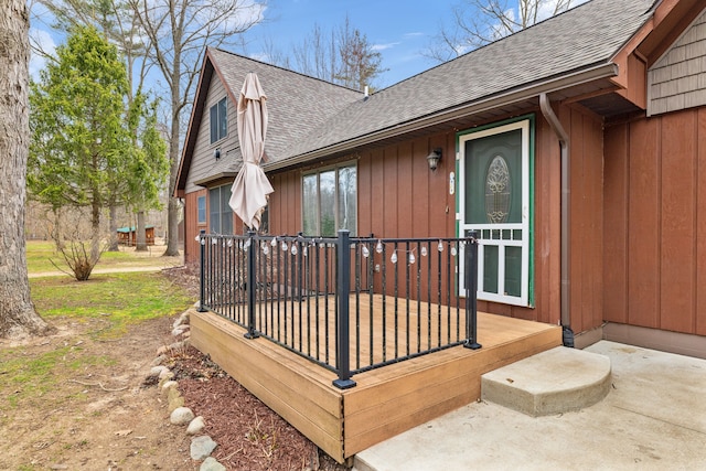 4824 Little Cedar Creek Dr, Attica, MI 48412 - doorway to property with roof with shingles and a wooden deck
