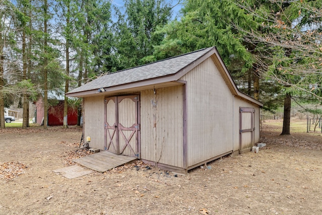 4824 Little Cedar Creek Dr, Attica, MI 48412 - view of shed featuring view of wooded area