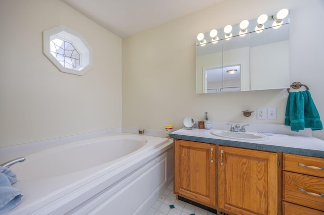 full bath with vanity, tile patterned flooring, and a bath