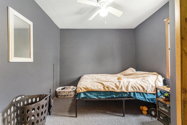 carpeted bedroom featuring a ceiling fan