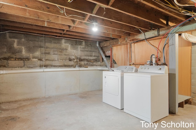 washroom with laundry area and separate washer and dryer