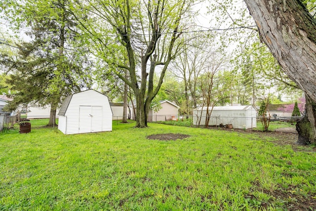 710 Robinwood St, Pontiac, MI 48340 - view of yard with a storage shed and an outdoor structure