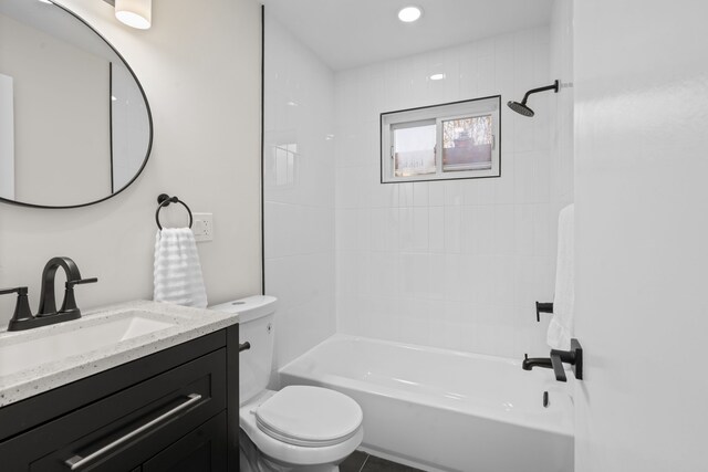 full bathroom with toilet, shower / tub combination, and vanity