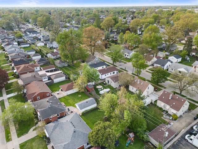 aerial view of property's location with nearby suburban area