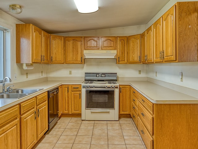 kitchen with vaulted ceiling, a sink, under cabinet range hood, range with gas stovetop, and black dishwasher