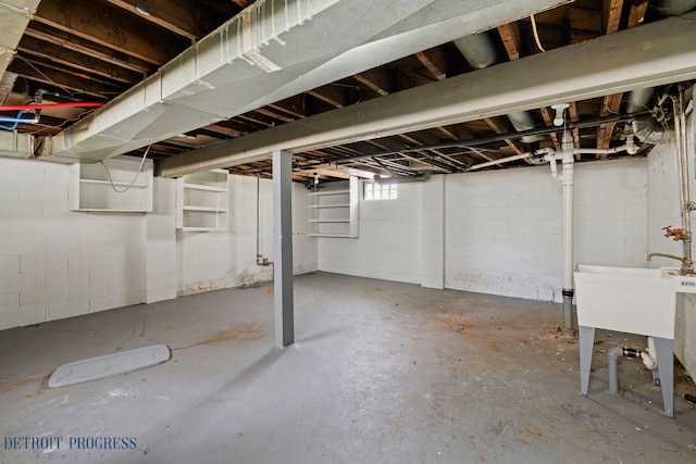 basement with concrete block wall