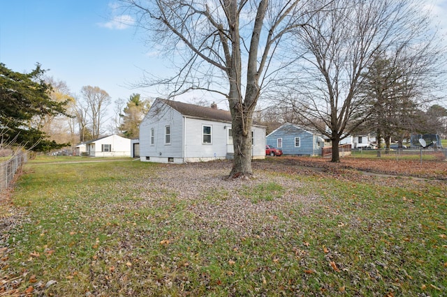 exterior space with fence and a chimney