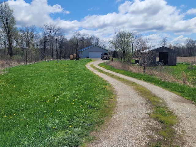 view of street featuring driveway