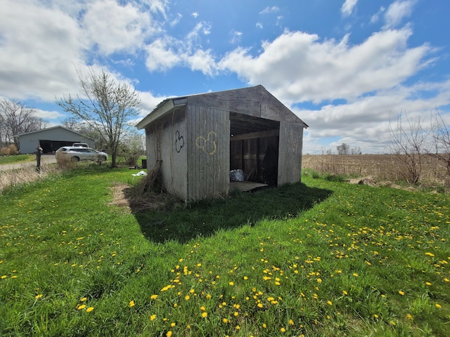 view of outbuilding featuring an outdoor structure