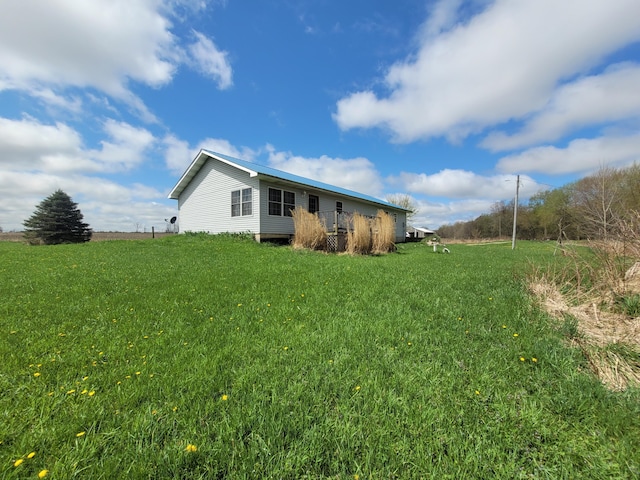 exterior space featuring a lawn