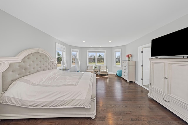 bedroom featuring recessed lighting, access to outside, and dark wood-type flooring