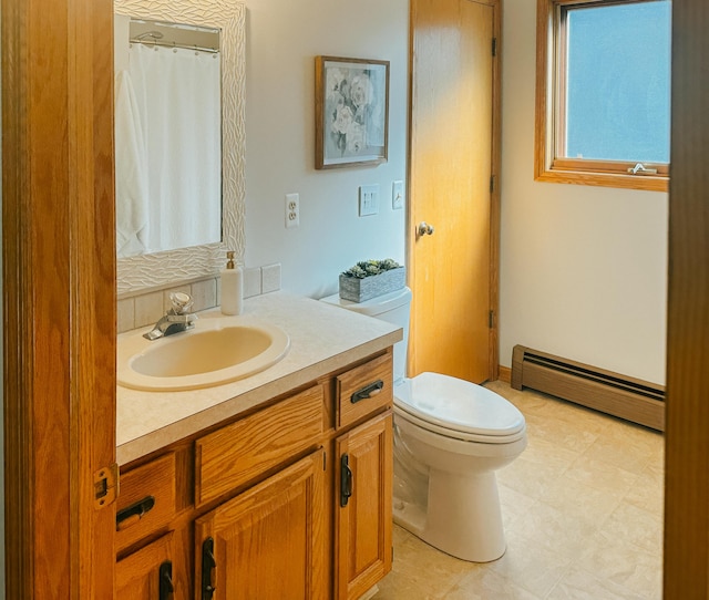 full bath with toilet, a baseboard heating unit, a shower with shower curtain, and vanity
