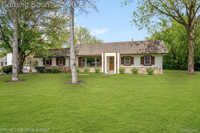 3930 Harris Ln, West Bloomfield, MI 48323 - single story home with a front yard, stone siding, and roof with shingles