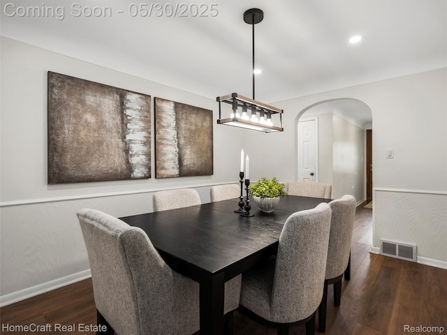 3930 Harris Ln, West Bloomfield, MI 48323 - dining space featuring arched walkways, wood finished floors, baseboards, and recessed lighting