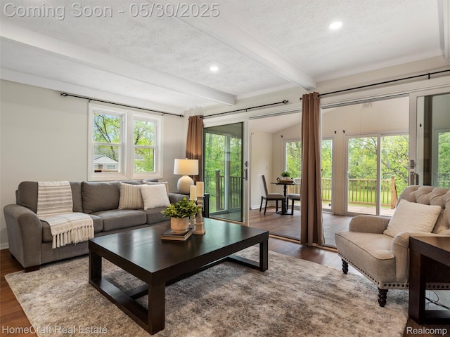 3930 Harris Ln, West Bloomfield, MI 48323 - living room with beam ceiling, recessed lighting, wood finished floors, a textured ceiling, and baseboards
