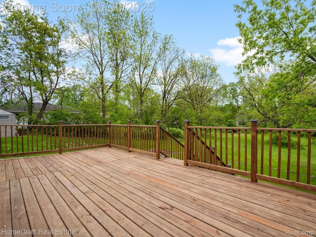 3930 Harris Ln, West Bloomfield, MI 48323 - wooden deck featuring a lawn