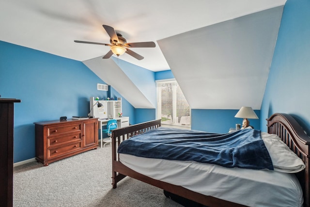carpeted bedroom with visible vents, a ceiling fan, and lofted ceiling