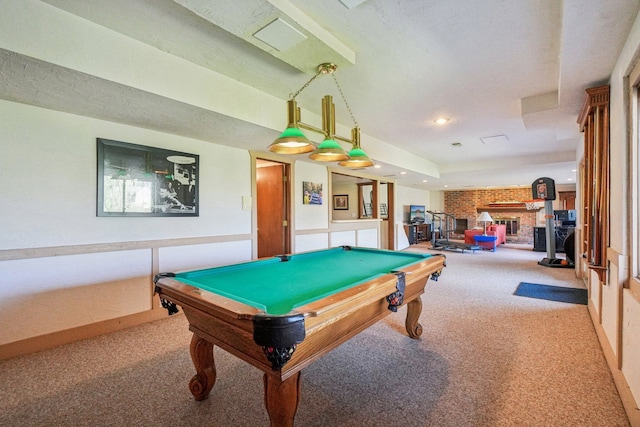 playroom featuring carpet floors, a fireplace, and pool table