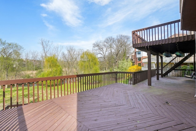 wooden terrace featuring stairway