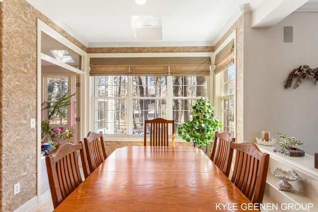 dining space with crown molding and visible vents