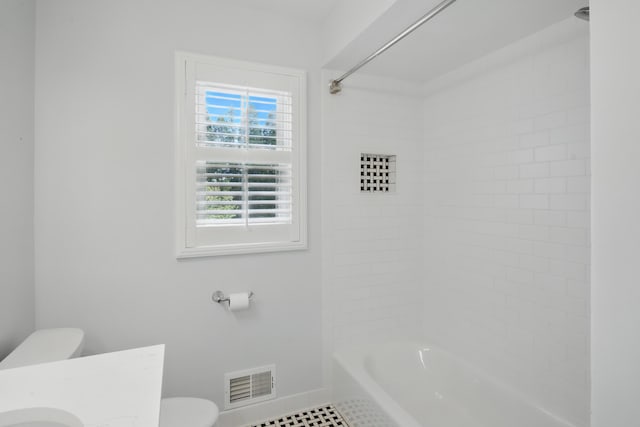 bathroom featuring visible vents, tile patterned flooring, vanity, toilet, and baseboards