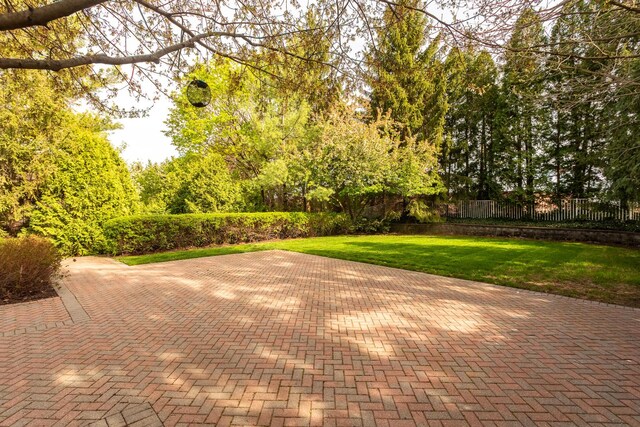 view of patio featuring fence
