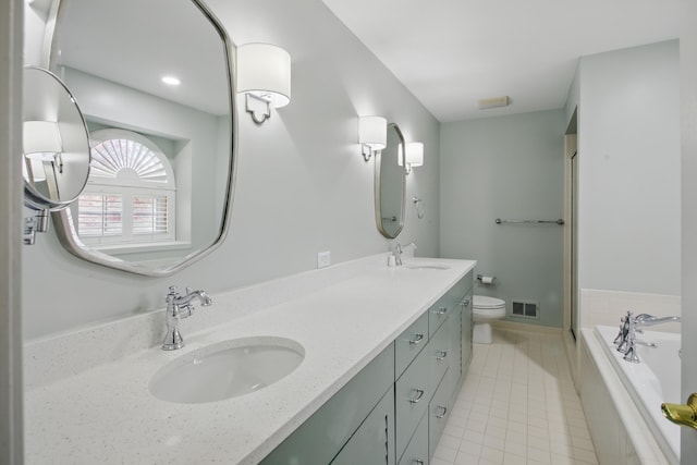 bathroom featuring visible vents, a sink, tile patterned floors, and double vanity