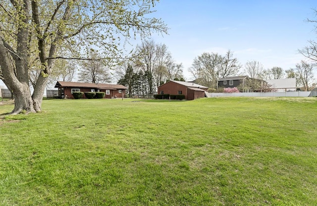 view of yard with fence