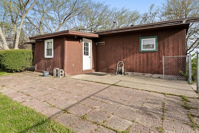 back of property with a patio area