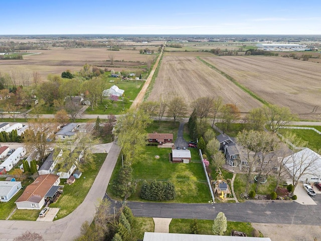 birds eye view of property featuring a residential view and a rural view