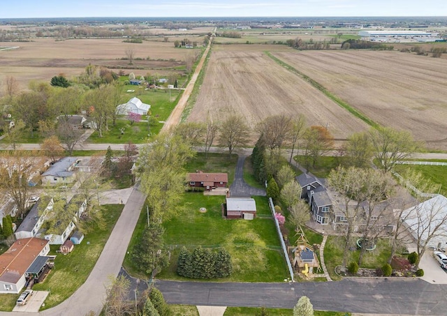 drone / aerial view featuring a rural view and a residential view