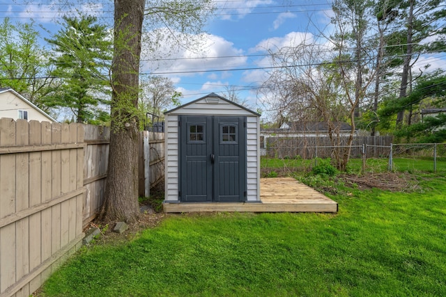 view of shed featuring a fenced backyard