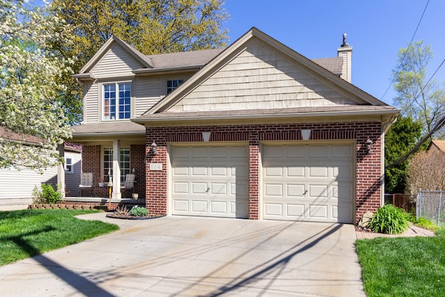 view of front facade with a garage, fence, a chimney, brick siding, and driveway