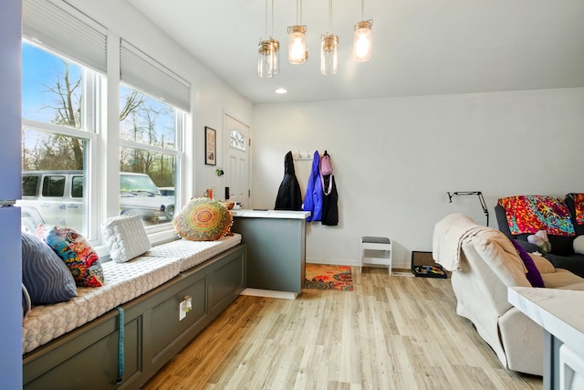 mudroom featuring light wood-style floors, baseboards, and recessed lighting