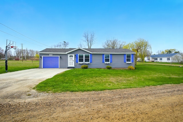 ranch-style house featuring driveway, a front yard, and a garage