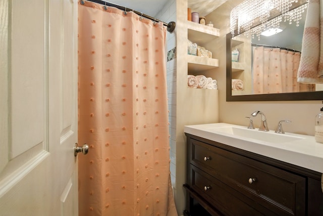 full bath with vanity and curtained shower