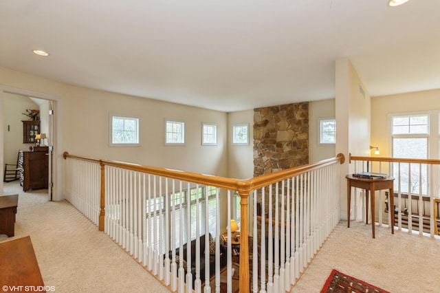 corridor featuring recessed lighting, visible vents, and carpet