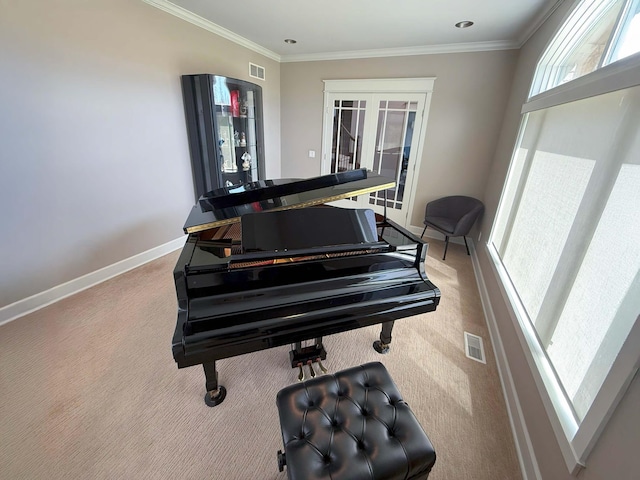 sitting room featuring carpet floors, baseboards, french doors, and visible vents