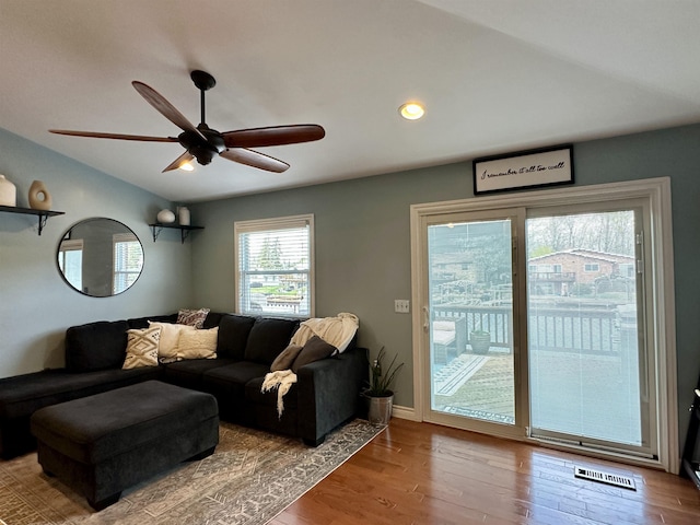 living area featuring visible vents, recessed lighting, ceiling fan, and wood finished floors