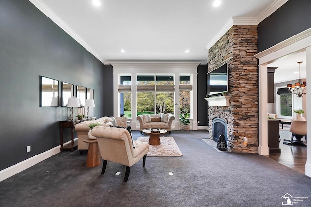 carpeted living area featuring recessed lighting, a stone fireplace, ornamental molding, and baseboards