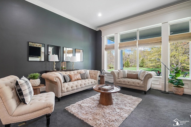 living room with crown molding, recessed lighting, and carpet