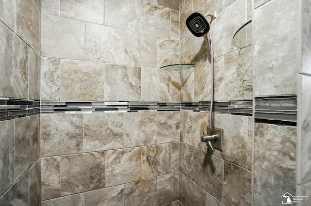 details featuring tiled shower