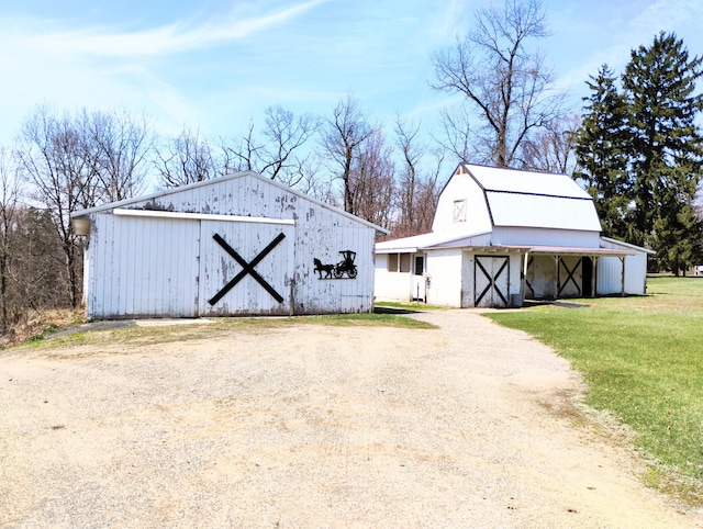 3100 Whipple Rd, Jackson, MI 49201 - view of barn featuring dirt driveway and a yard