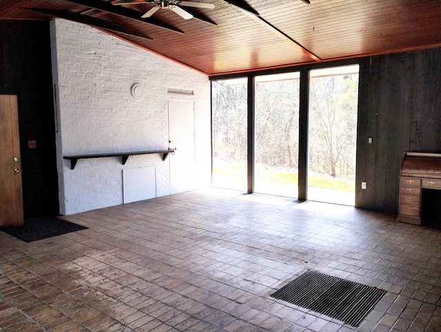 3100 Whipple Rd, Jackson, MI 49201 - unfurnished living room with a ceiling fan, visible vents, vaulted ceiling, wooden ceiling, and brick floor