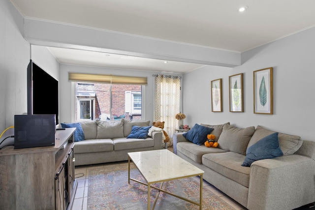 living area with recessed lighting and ornamental molding