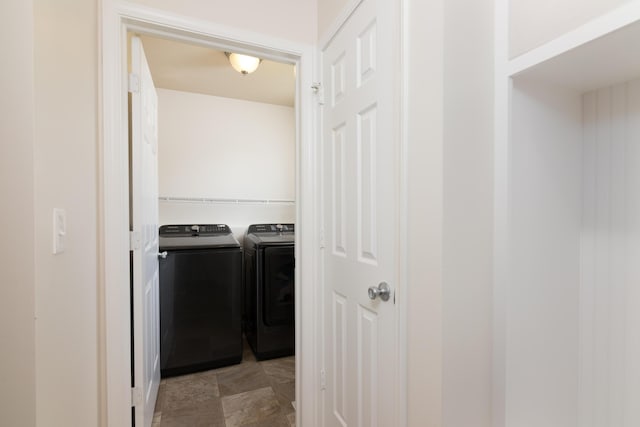 washroom with laundry area and washing machine and clothes dryer