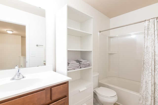 bathroom with shower / bath combo with shower curtain, toilet, and vanity