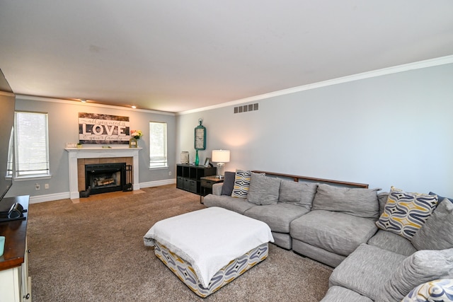 51466 Promenade Ln, New Baltimore, MI 48047 - carpeted living room featuring crown molding, a tiled fireplace, and baseboards