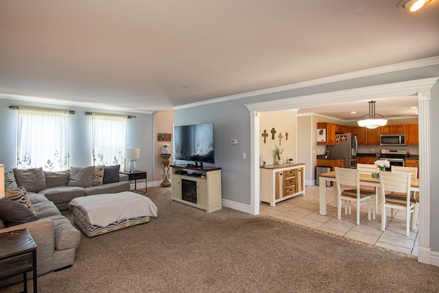 51466 Promenade Ln, New Baltimore, MI 48047 - living area featuring light carpet, ornamental molding, baseboards, and light tile patterned floors